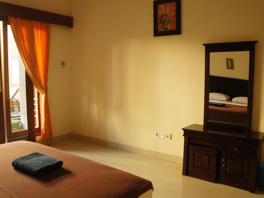 Waringin Homestay Kuta  Phòng bức ảnh