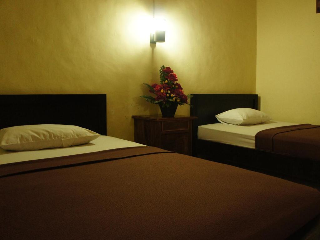 Waringin Homestay Kuta  Phòng bức ảnh