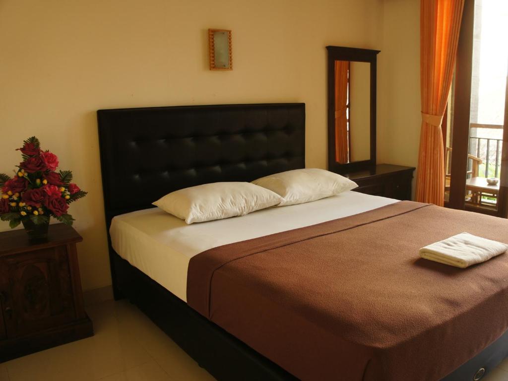 Waringin Homestay Kuta  Phòng bức ảnh